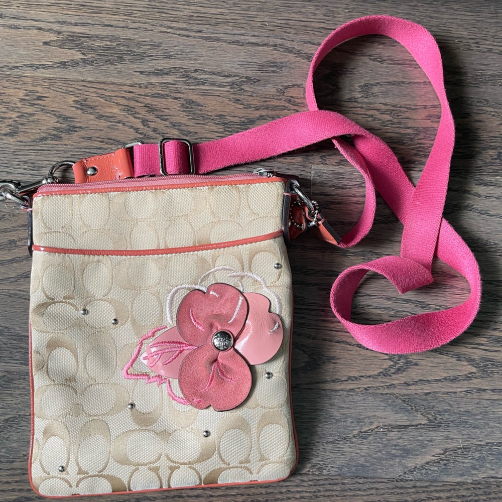 Coach brown and pink small over the shoulder bag in great condition.